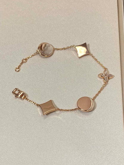 [Luxora]Armband mit Sternen- und Sonnenmotiven, 5-teiligem Motiv, rosa-golden,
